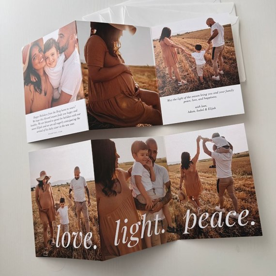 folded card with photo placeholders and printed text