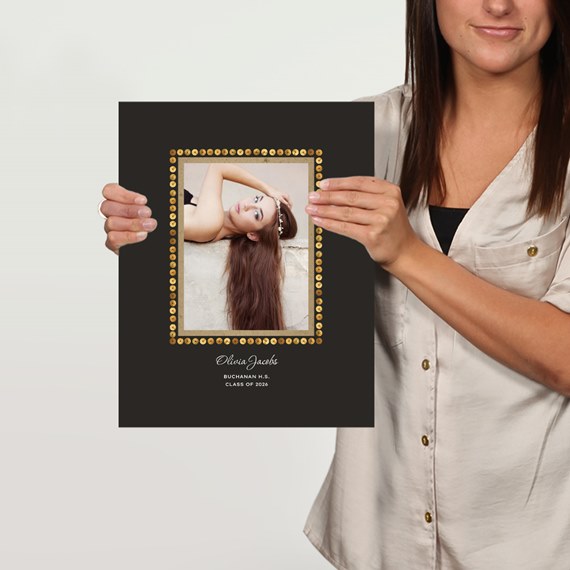 photo placeholder with gold dot border on black background