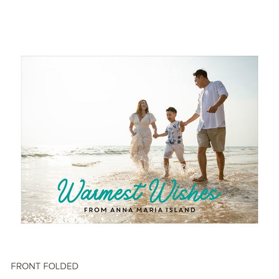 Folded greeting card with a family of three running at the beach and teal 