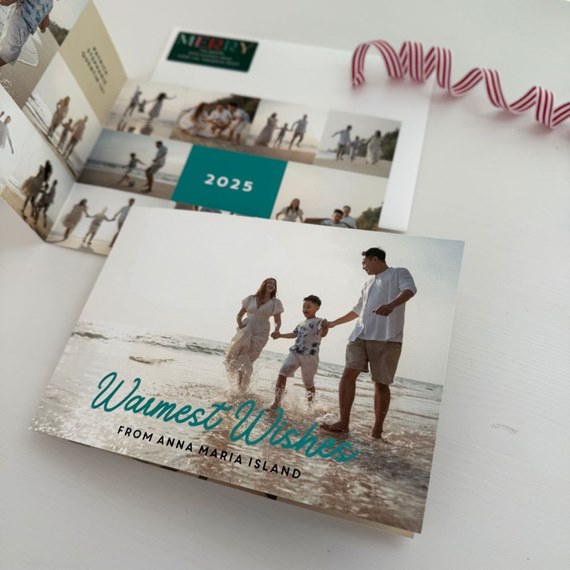 beach scene card with family photo area and text