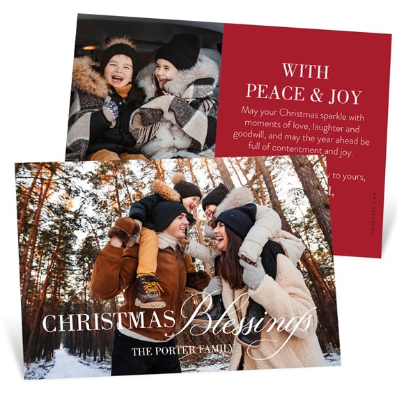 Christmas photo greeting card with family in winter coats in a snowy forest and a red back panel with holiday message