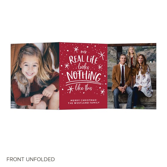 Tri-fold Christmas card with family photos on the sides and a red center panel with white script holiday message