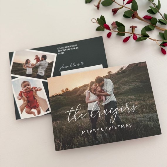 Christmas postcard with photo placeholders and cursive text
