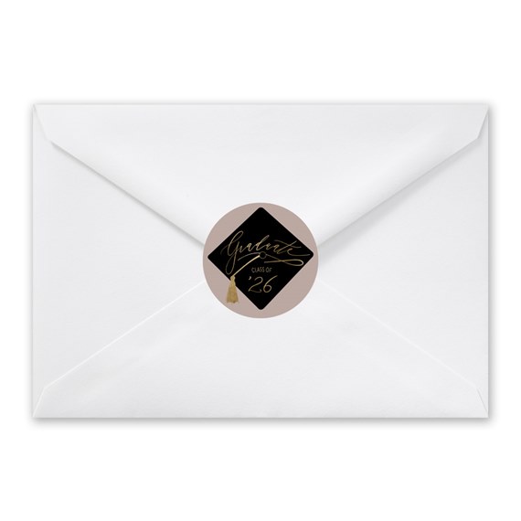 white envelope with graduation seal