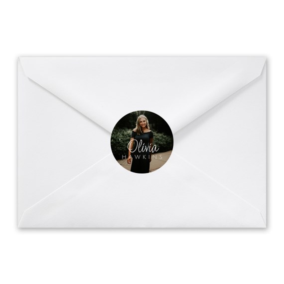white envelope with circular photo placeholder seal