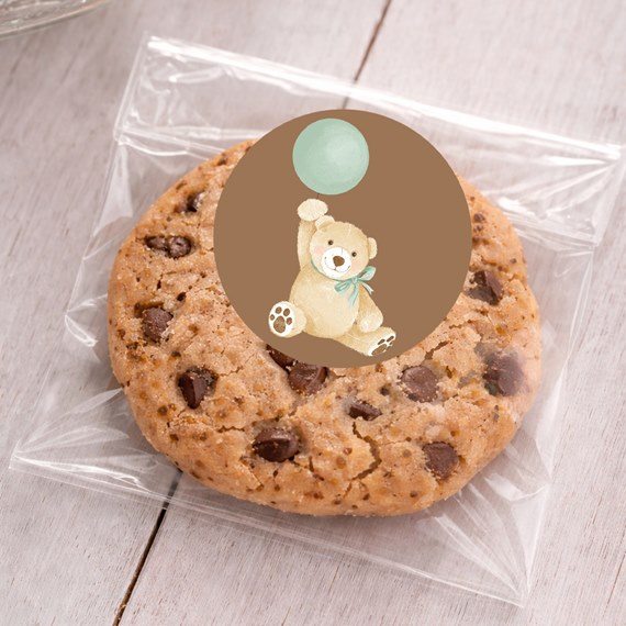 round sticker with bear and balloon on cookie