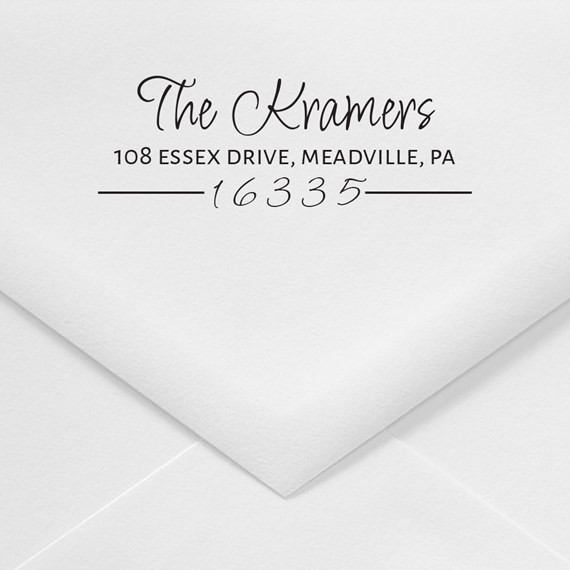 white envelope with printed name and address