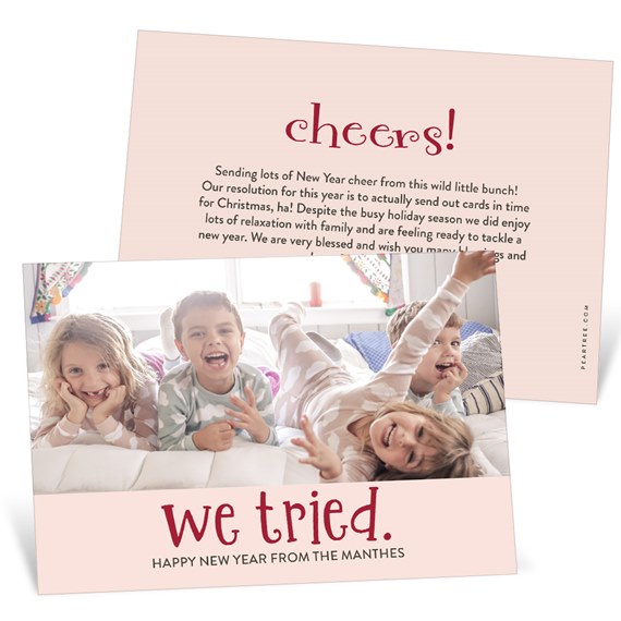 New Year photo card with four children on a bed, pale pink background and red we tried. headline