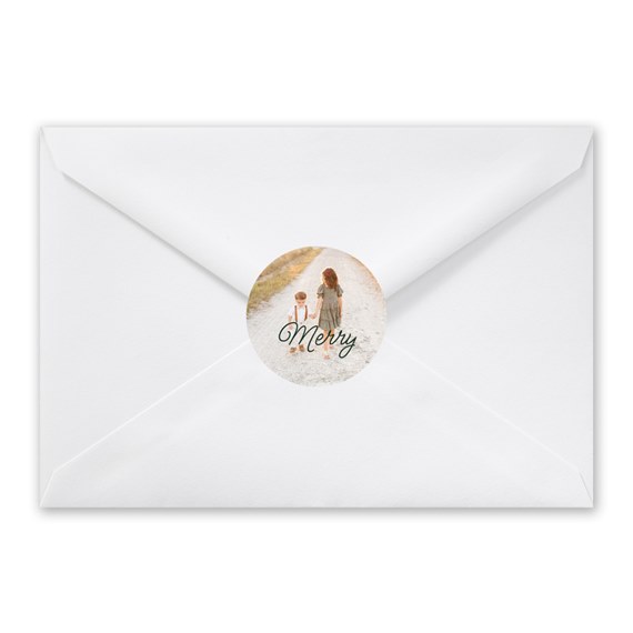 white envelope with circular photo placeholder and 'Merry' text