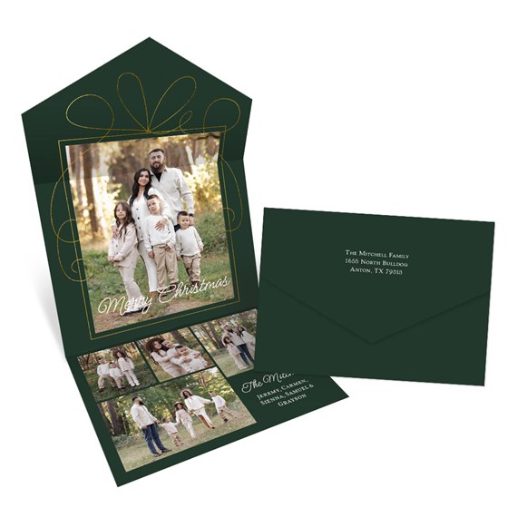 green Christmas card with photo area and gold bow design