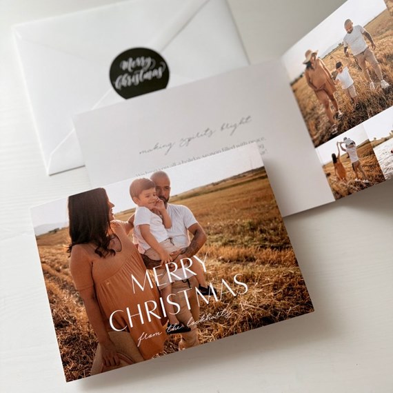 Christmas card with family photo and text