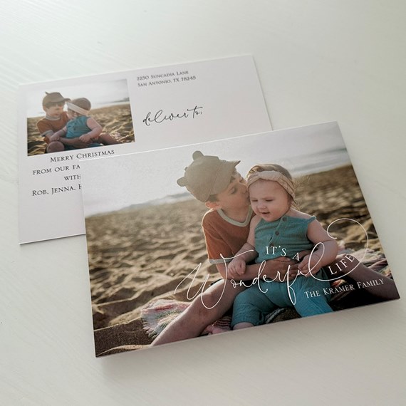 postcard design with photo area and festive text