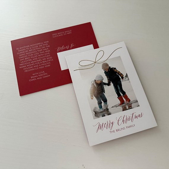 Christmas postcard with photo area, gold bow design, red text
