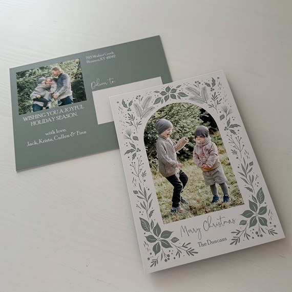 Christmas postcard with floral design and photo area