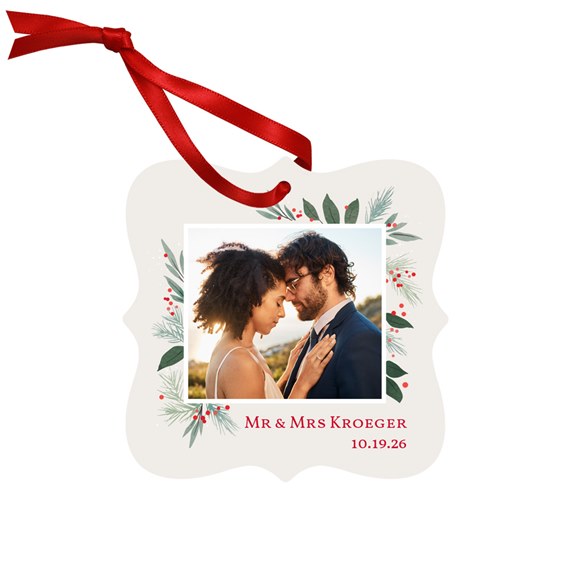 ornament with photo placeholder, red ribbon, decorative foliage