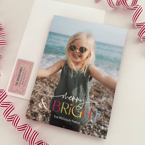 holiday card with photo area and colorful text