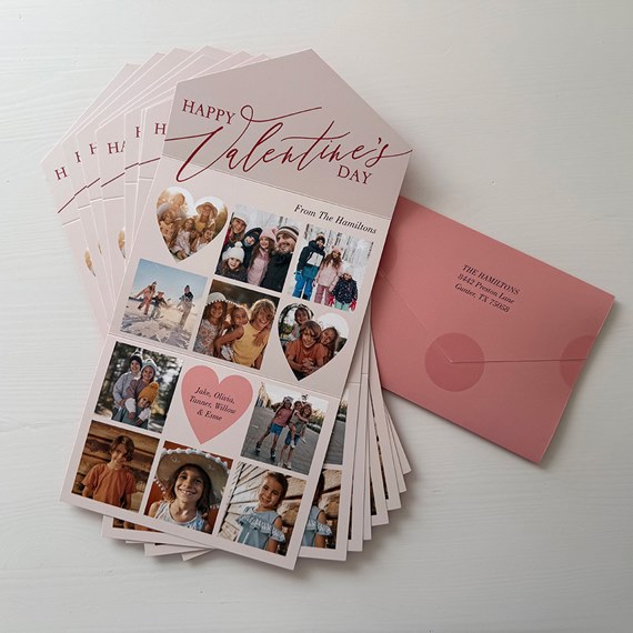 Valentine's Day card with heart-shaped photo frames and pink envelope