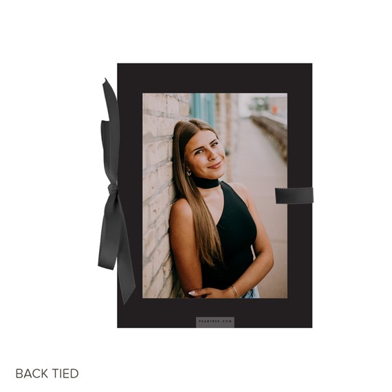 black photo frame with ribbon tie, photo placeholder
