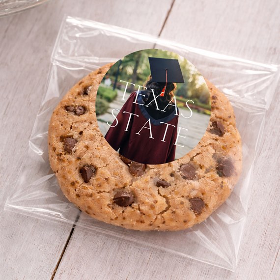 round sticker with graduation theme on cookie
