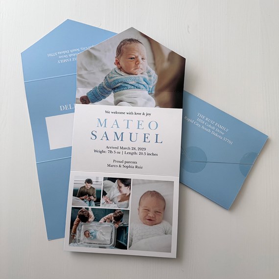 announcement card with photo area, blue envelope
