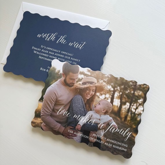 family photo announcement card with scalloped edges and text area