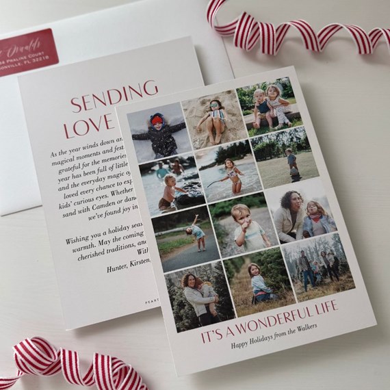 holiday photo collage card with multiple family images and printed greeting, shown with envelope and red-striped ribbon