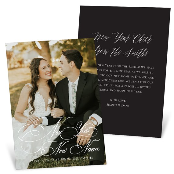 New Year photo card with bride and groom on front and dark message panel with white script on back