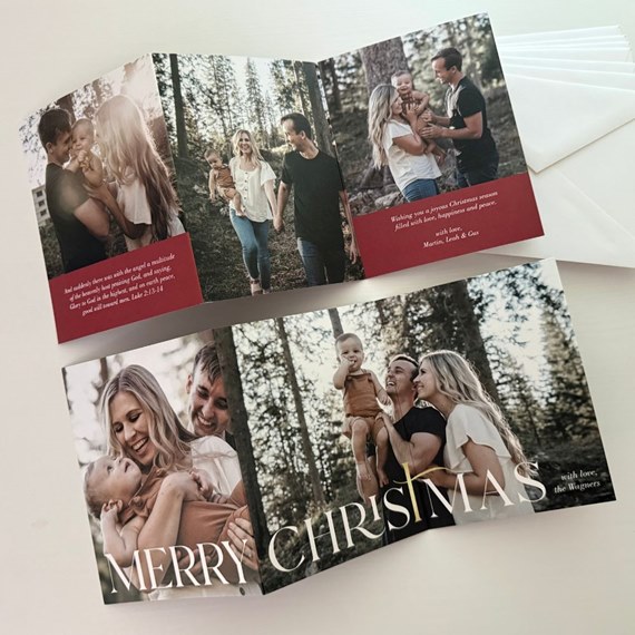 Christmas card with family photos and text, photo area included