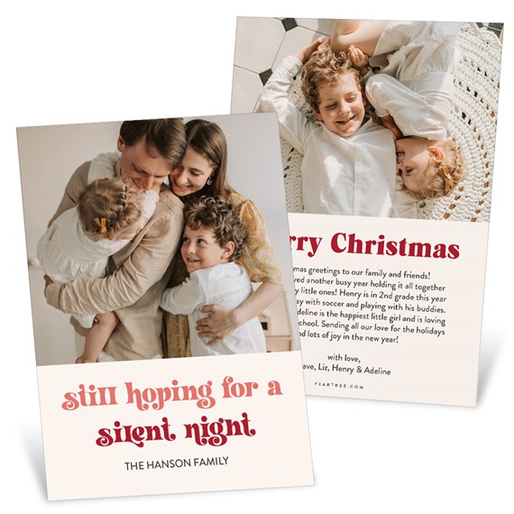two-sided Christmas photo card with family portraits and red decorative headline on a cream background