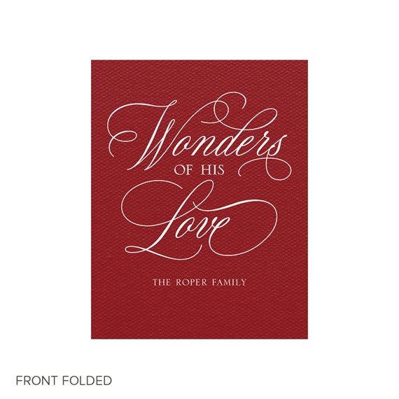 red textured Christmas card with white script text