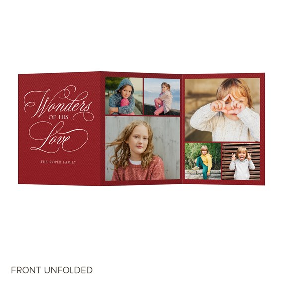 Christmas card with photo placeholders and script text