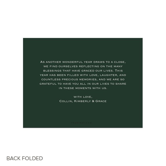 A4 folded Christmas card back with centered white calligraphy message on dark green background