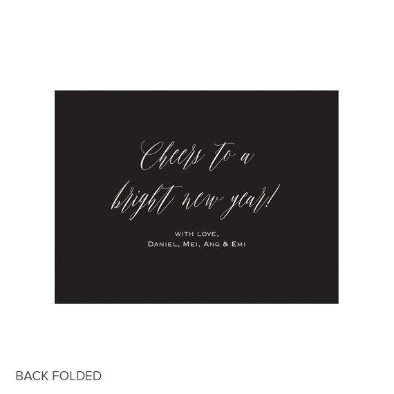Folded A4 black New Year card with white calligraphy reading 'Cheers to a bright new year!'