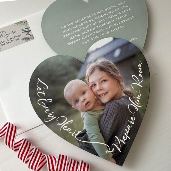 heart-shaped card with photo area and text