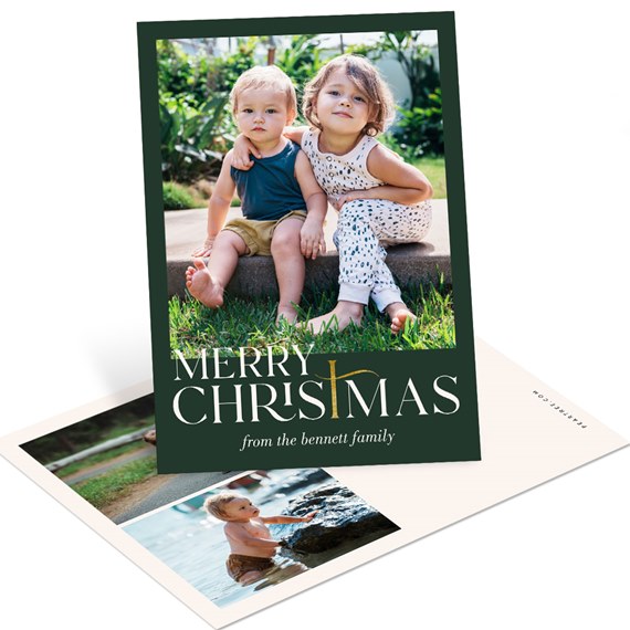 vertical Christmas photo card with dark green border, portrait photo of two children, white 