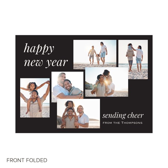 Folded New Year photo card with black background and white-framed beach family photo collage with script greeting
