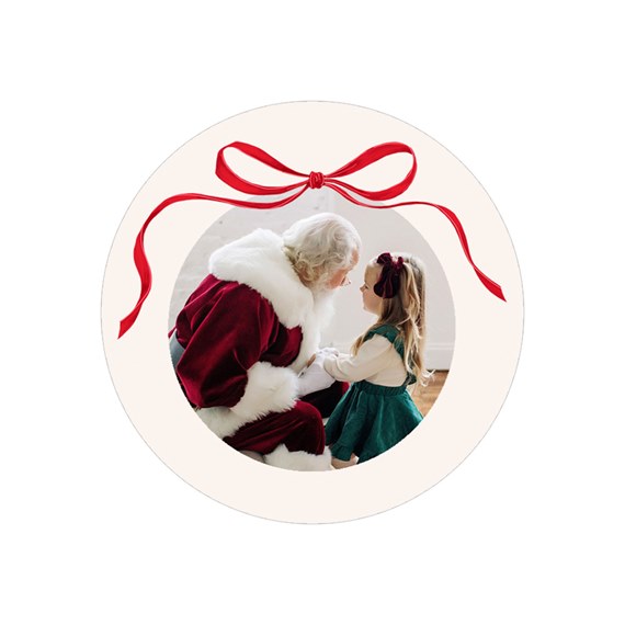 circular envelope seal with red bow and photo area
