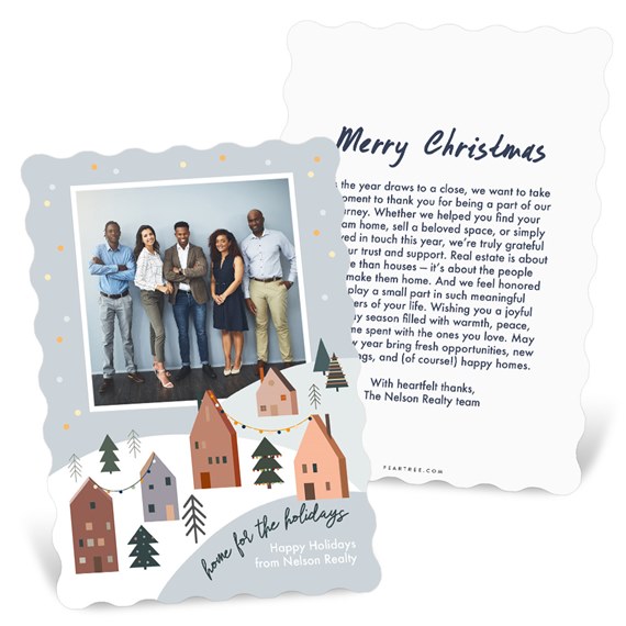 Business holiday card with scalloped edges, winter village illustration, team photo placeholder and Merry Christmas greeting