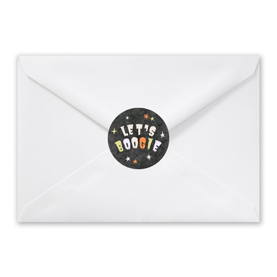 white envelope with round sticker seal, colorful text