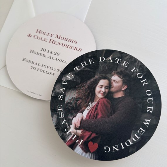 circular save the date card with photo area and text