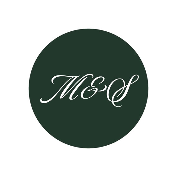 circular seal with script letters M&S