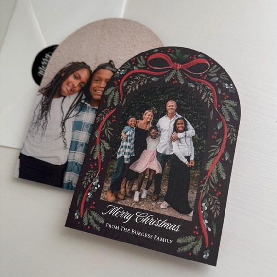 Christmas card with botanical arch design and family photo area