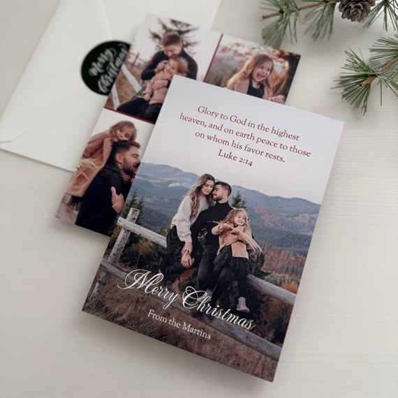 Christmas card with scenic background and text