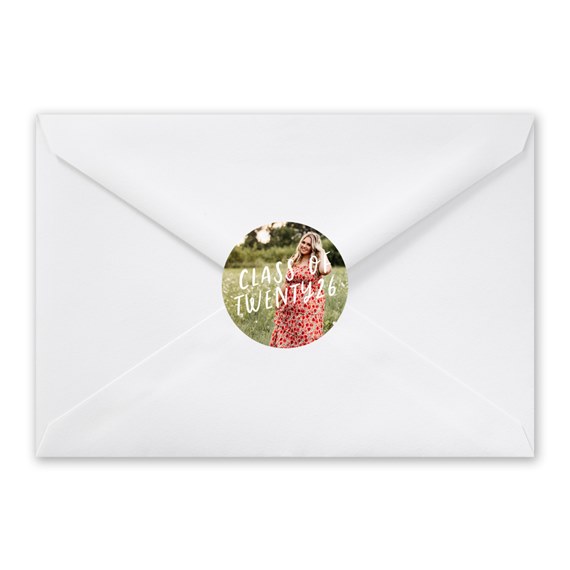 white envelope with round photo seal and text area