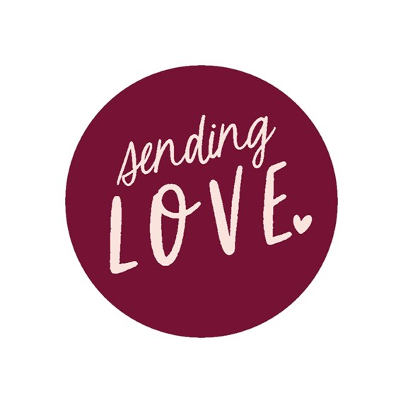 round envelope seal with sending love text