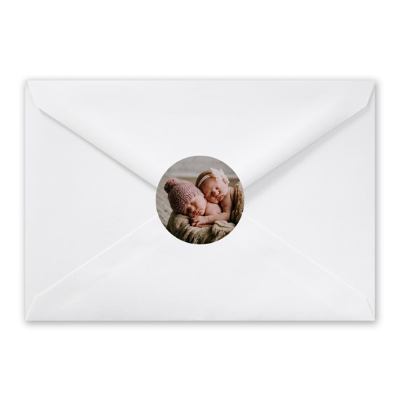white envelope with circular photo placeholder