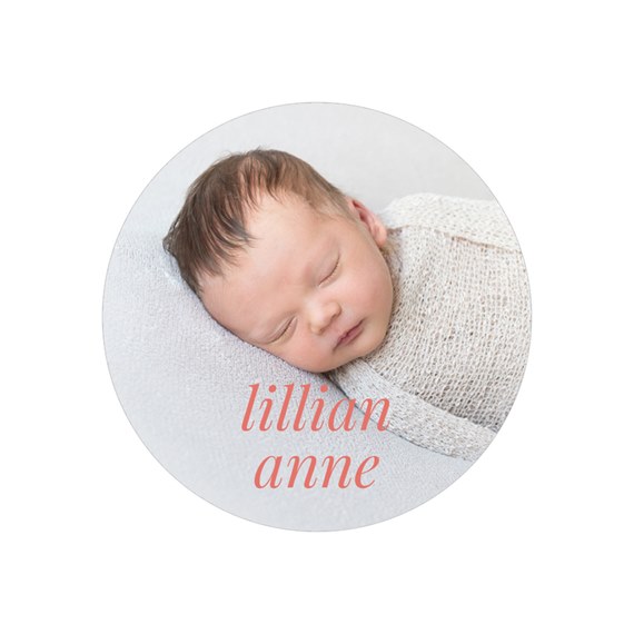 round envelope seal with baby photo area and text
