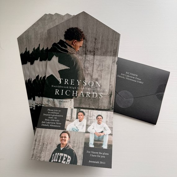 graduation invitation with photo collage and black envelope