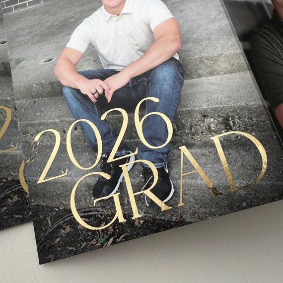 graduation invitation with gold foil text and photo area