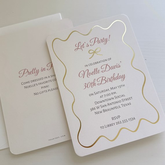 birthday invitation card with gold border and pink text